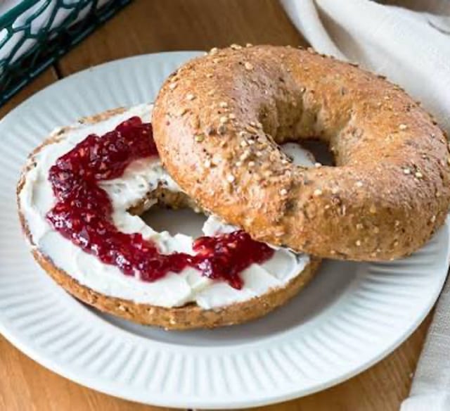 Bagel With Cream Cheese And Jelly.